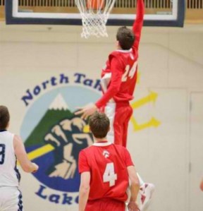Trent McMullen Trent McMullen of Truckee going for a dunk in the Boys Varsity Basketball Game vs. North Tahoe High School